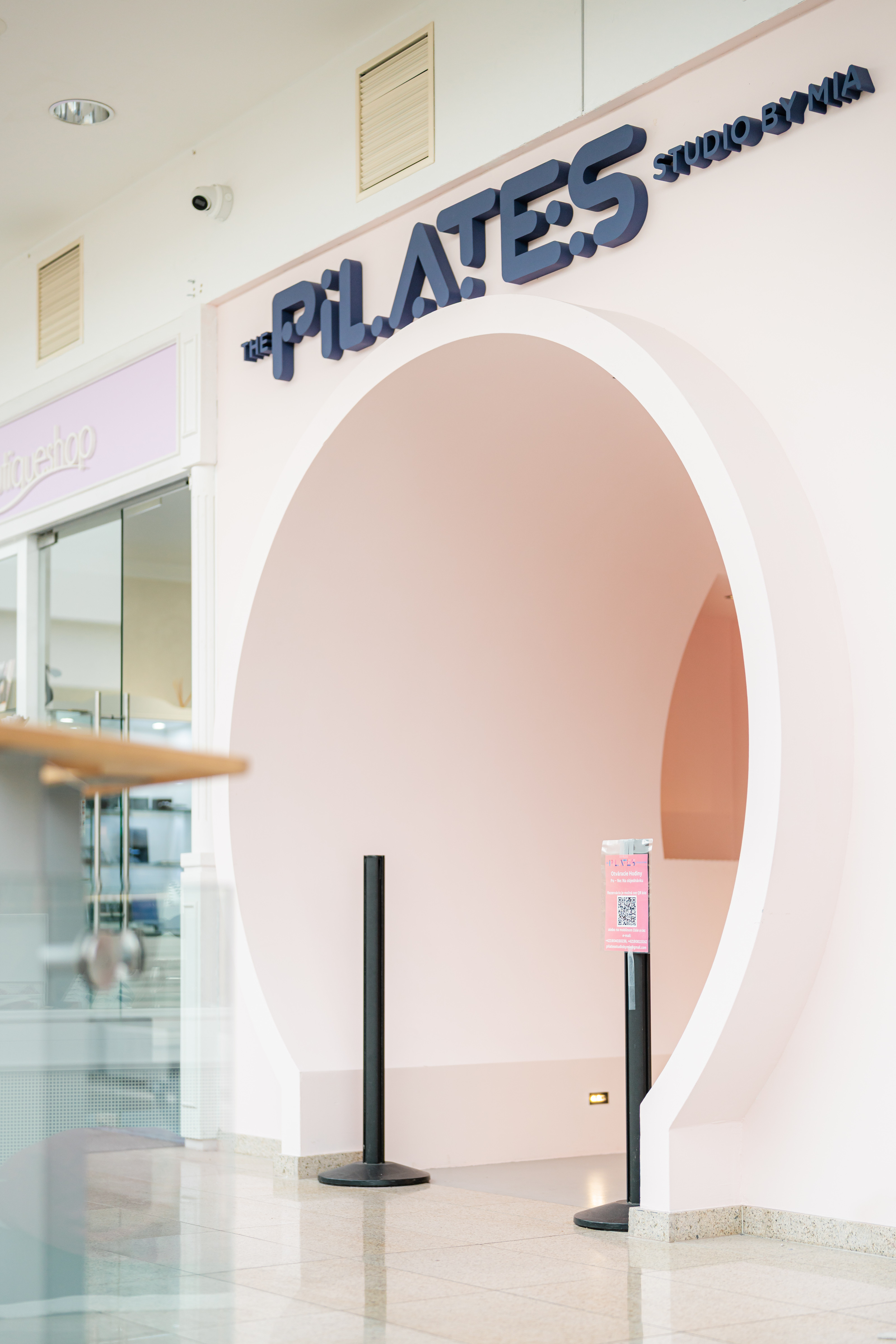 Mia exercising on the Pilates reformer